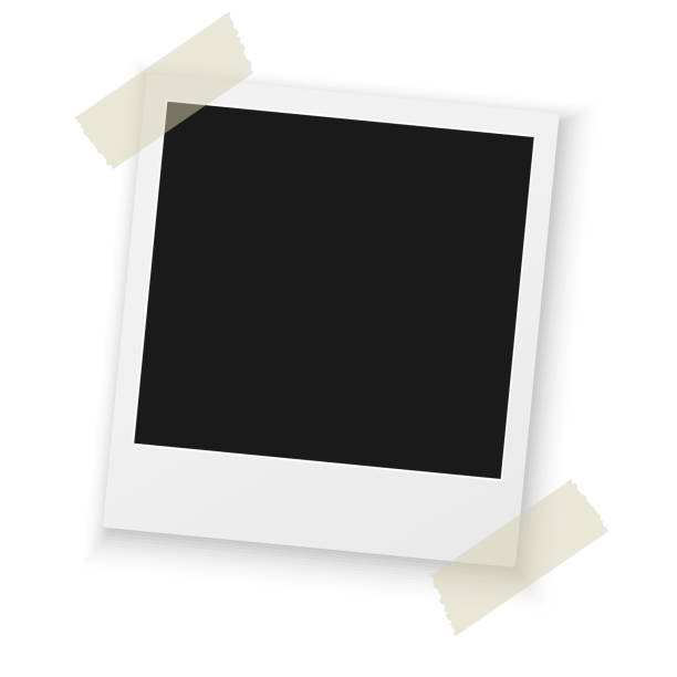 istock Vintage Photo Frame Sticked on Duct Tape to Background 496540132