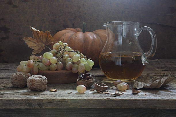 istock Still-life with grapes, walnuts and grape juice 496543464