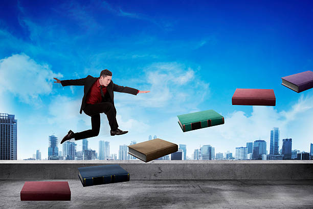 istock Business person step up flying book that look like stair 496544414