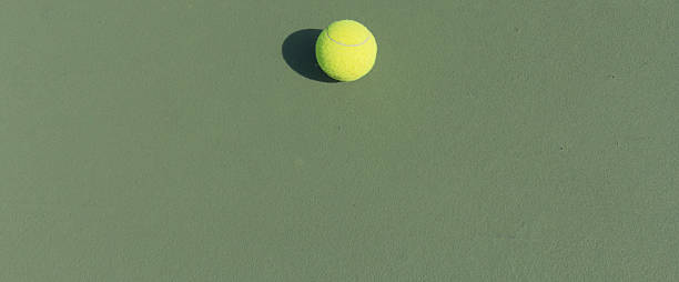 istock Tennis Ball on the Court 496545196