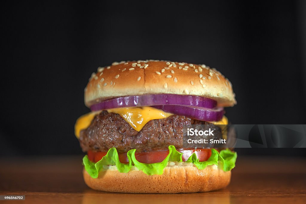 cheeseburger appetizing cheeseburger with red onion closeup Close-up Stock Photo