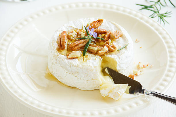 istock Baked camembert with honey and pecans. 496546932