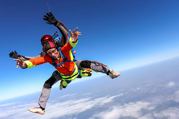istock Skydiving photo. Tandem. 496550060