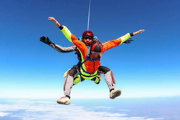 istock Skydiving photo. Tandem. 496550224