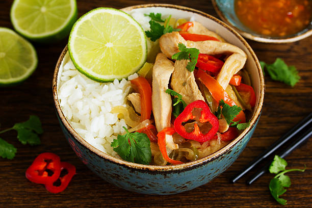 istock Stir fry with turkey and vegetables with rice. 496551598