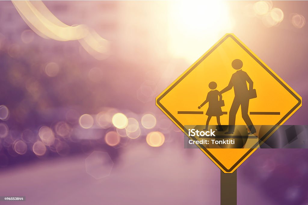 School sign.Traffic sign road on blur road abstract background. School sign.Traffic sign road on blur road abstract background.Retro color style. 2015 Stock Photo