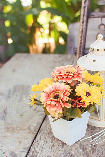 flower on old wooden table