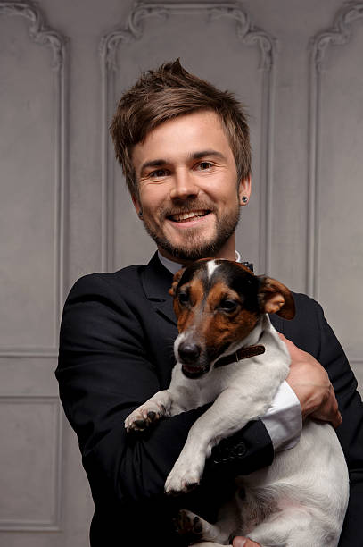 istock Young fellow with his dog 496558983