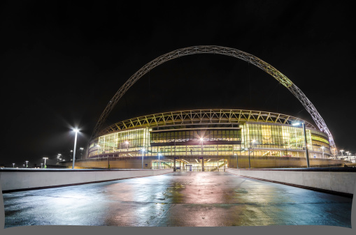 London, United Kingdom - November 27, 2013: Wembley Stadium is a UEFA category four stadium, with 90,000 seats it is the second largest stadium in Europe. New one built on the place of the old stadium ruined 2003