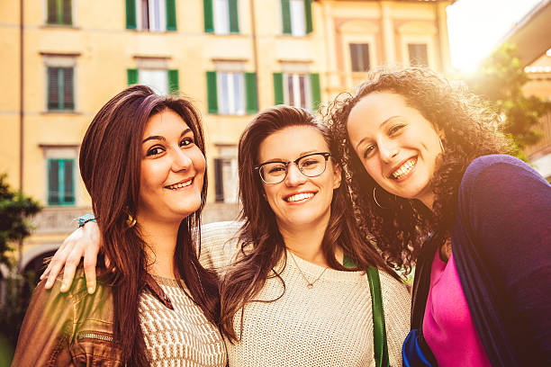 istock Three friends shopping outdoor 496560025