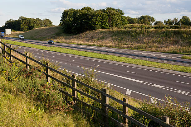 istock car on motorway with motion blur 496560173