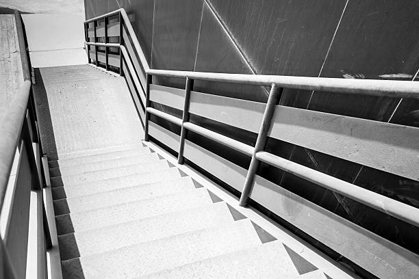 istock Industrial metal staircase perspective. Black and white photo 496562005