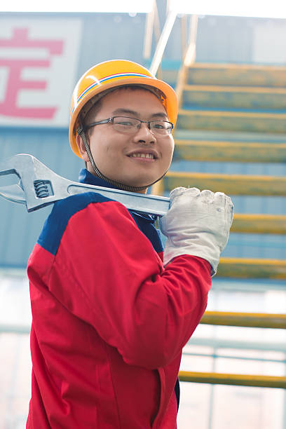 istock portrait of young worker 496564439