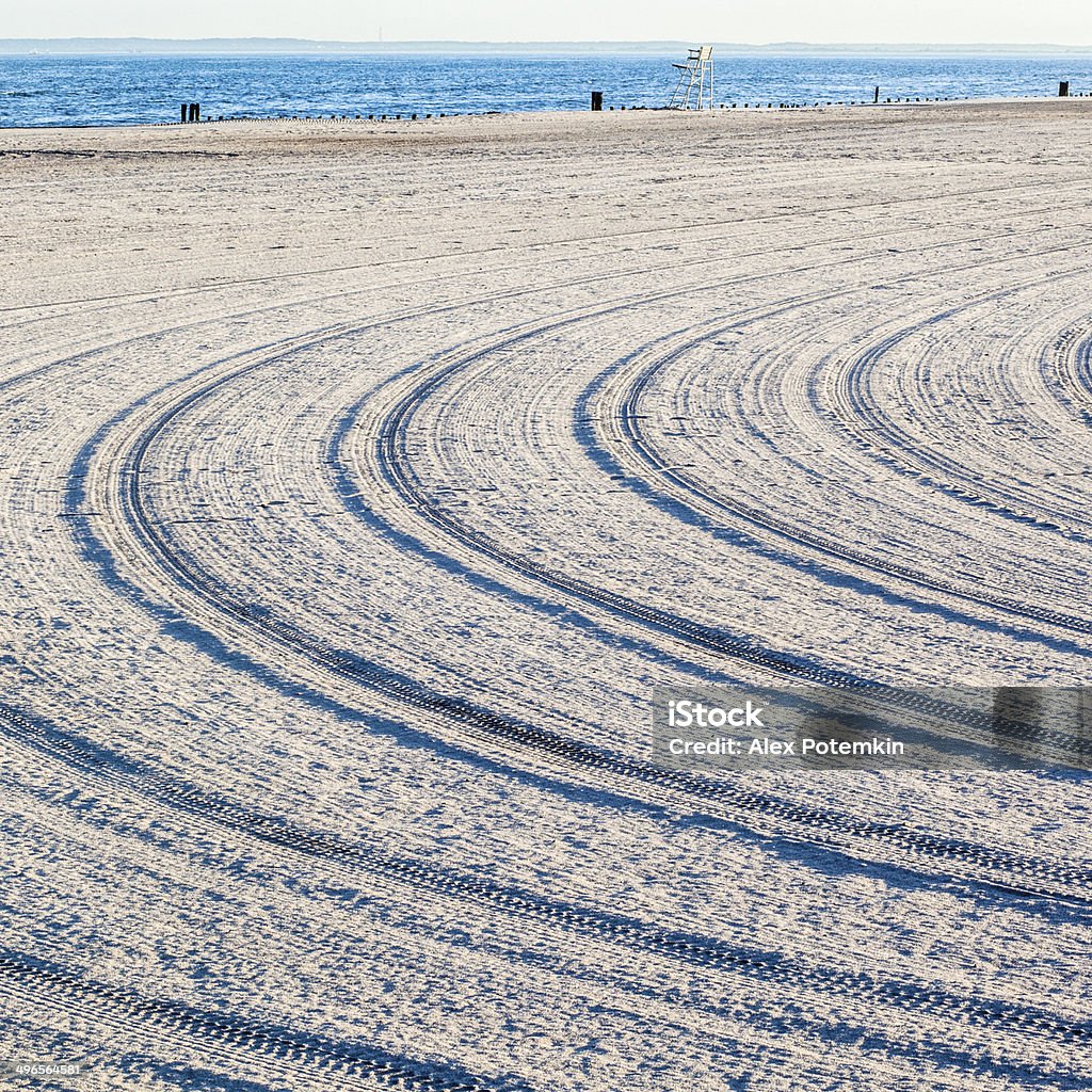 Beach sand after clean up sand of the beach after clean-up   Backgrounds Stock Photo