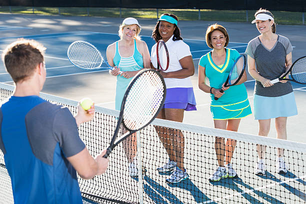 istock Ladies' tennis clinic 496565797