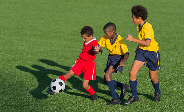 istock Young Footballers In Action 496565835