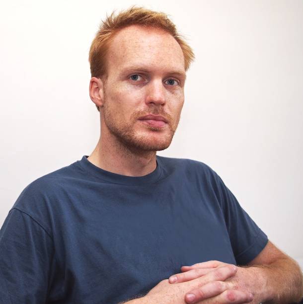 Portrait of a young red-haired man