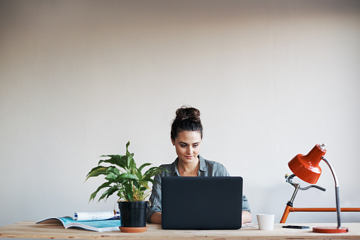 Cropped shot of a young businesswoman working from homehttp://195.154.178.81/DATA/i_collage/pu/shoots/805864.jpg