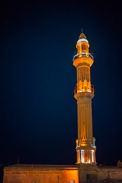 Old traditional stone minaret at  middleeastern town mardin turkey