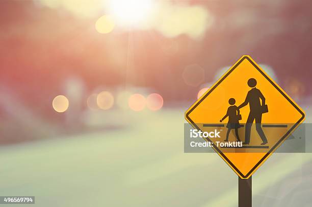 School Signtraffic Sign Road On Blur Road Abstract Background Stock Photo - Download Image Now