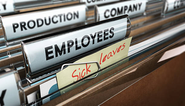 Sick Leave Close up on a file tab with the word employees plus a note with the text sick leaves, blur effect at the background. Concept image for illustration of sick leave entilement. abandoned stock pictures, royalty-free photos & images