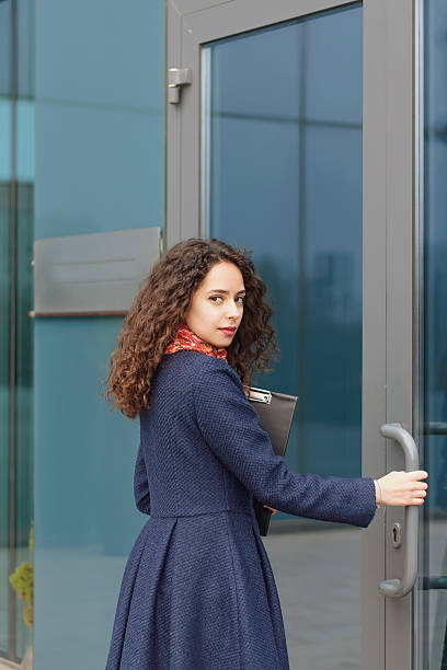 istock Business woman with a folder in her hand 496572680