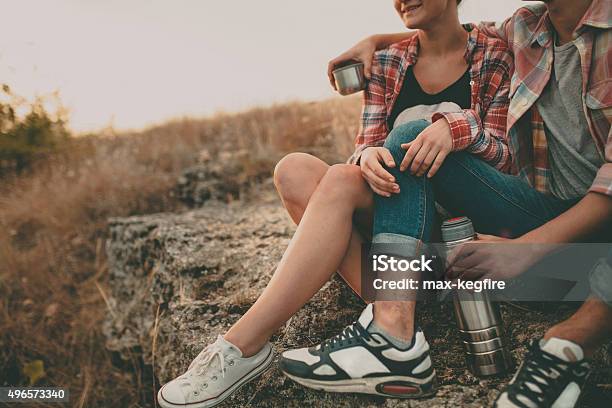 Cropped Hipsters Having A Cup Of Tea At Nature Stock Photo - Download Image Now - 2015, Adult, Adults Only