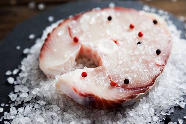 fresh swordfish on crushed ice stock photo