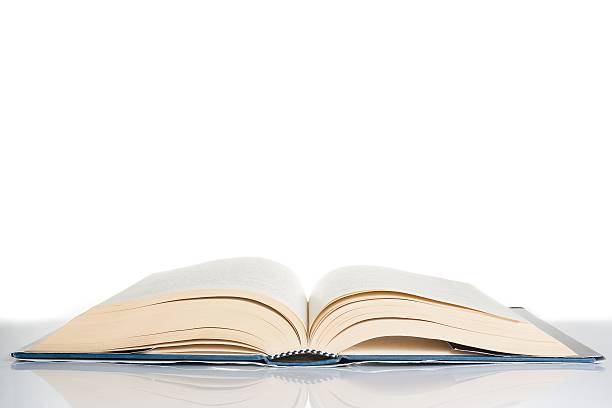 istock book isolated on table, culture concept with space for text 496576952