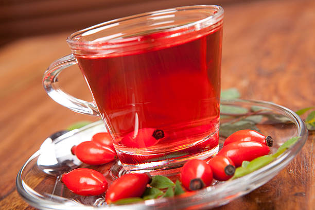 istock herbal rosehip tea an wooden background 496579174