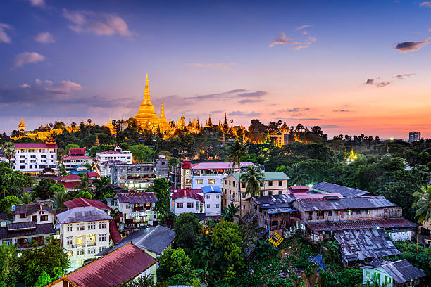 Yangon Myanmar Yangon, Myanmar skyline with Shwedagon Pagoda. pagoda photos stock pictures, royalty-free photos & images