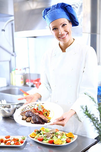 istock Proud female chef in her kitchen. 496582258