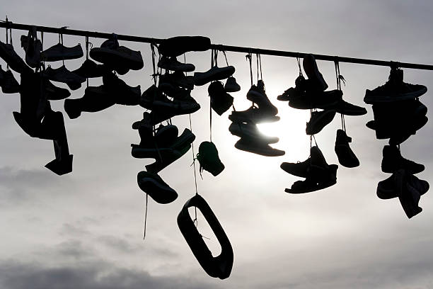 istock shoes on the rope 496583105