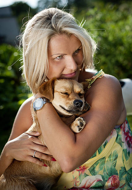 istock Woman playing with dog 496583181