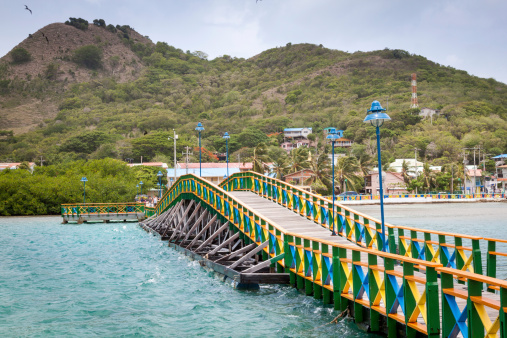 Lovers bridge connecting Santa Catalina and Providencia, Colombia. Providencia is a lot less touristic then the larger San Andres and only a 30 min plane ride away. Once there you get a true feeling of the Caribbean with great food, nature and people.