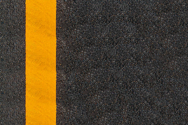 istock Yellow Line Printed On The Road 496583682