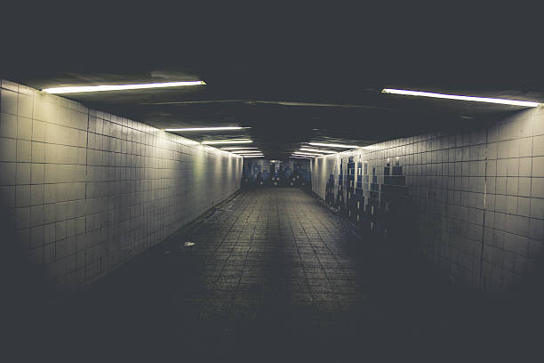 istock Dark corridor in a railway station 496583803