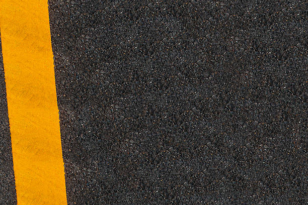 istock Yellow Line Printed On The Road 496584016