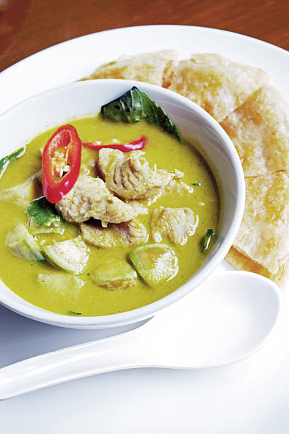 istock green curry with coconut milk 496585065