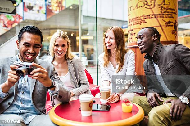 Four Friends In Hong Kong Cafe Stock Photo - Download Image Now - Adult, Adults Only, African Ethnicity