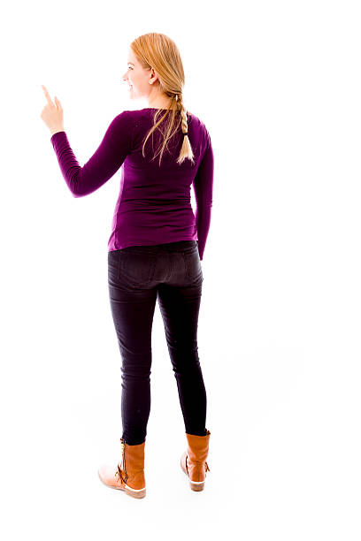 Rear view of a young woman using imagery virtual screen
