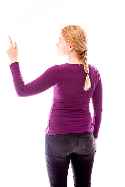 istock Rear view of a young woman using imagery virtual screen 496590603
