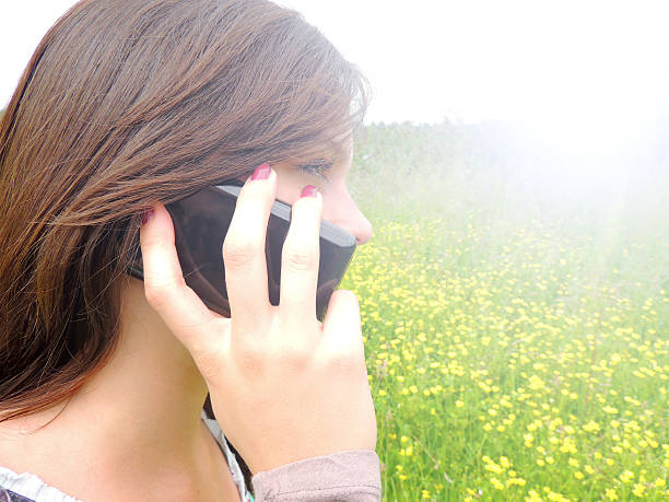 istock Young Woman with smartphone 496596479