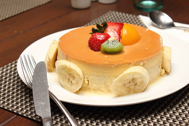 istock banana caramel cake on white plate 496596605