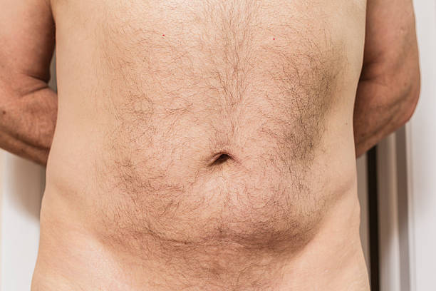 Men Human Hair Abdomen Belly Button Stock Photos, Pictures & Royalty-Free  Images - iStock