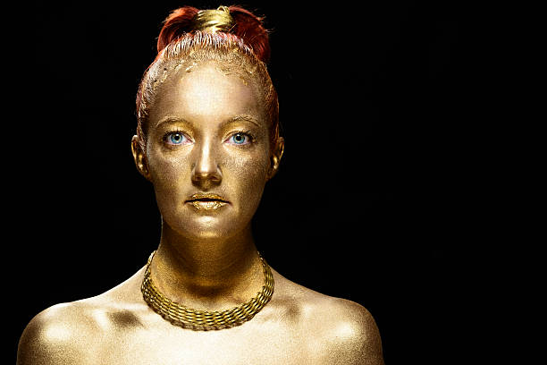 istock golden painted  girl 496597019