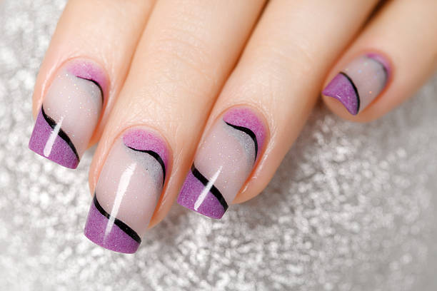 istock Female hands with beautiful manicure in gentle tones. 496597283