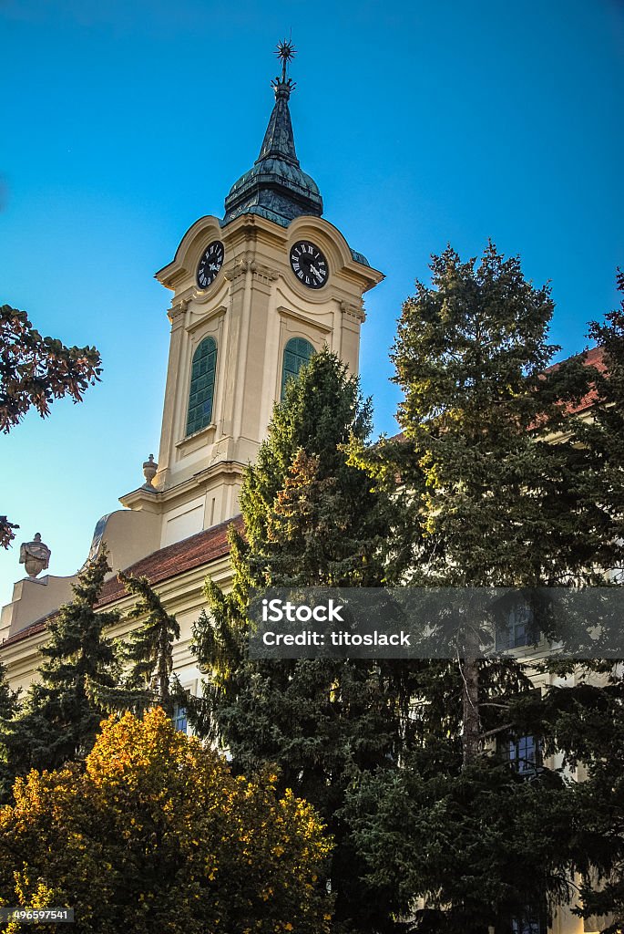 Clocktower of the Great Lutheran Church in Békéscsaba, Hungary The Great Lutheran Church in Békéscsaba, Hungary Bell Tower - Tower Stock Photo