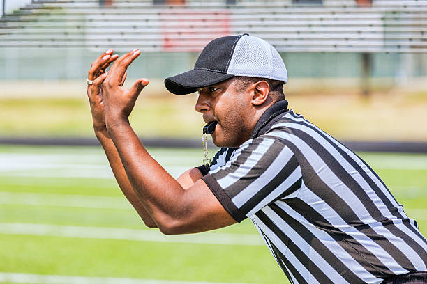 istock Football Referee Signals Ball was Caught 496597885
