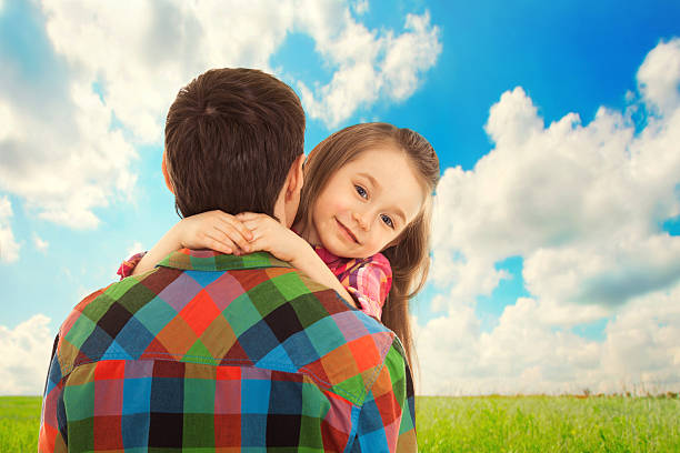 istock Little Girl hugs her father. 496599363